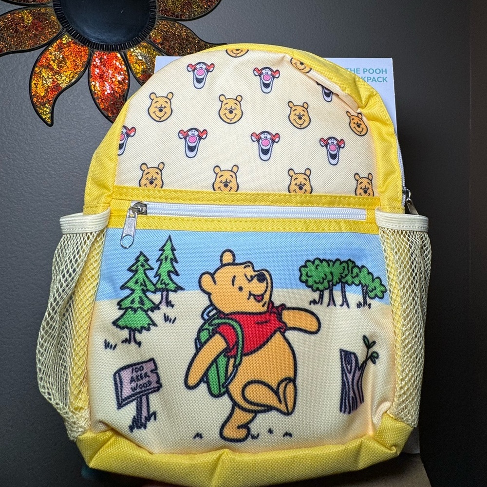 Winnie the Pooh Mini Yellow Backpack ☀️💛
Brand new in packaging!